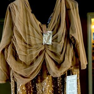 Beautiful taupe gown. 26w tall.